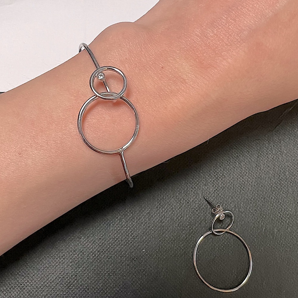 Agatha Paris Authentic sterling silver bracelet and earring.